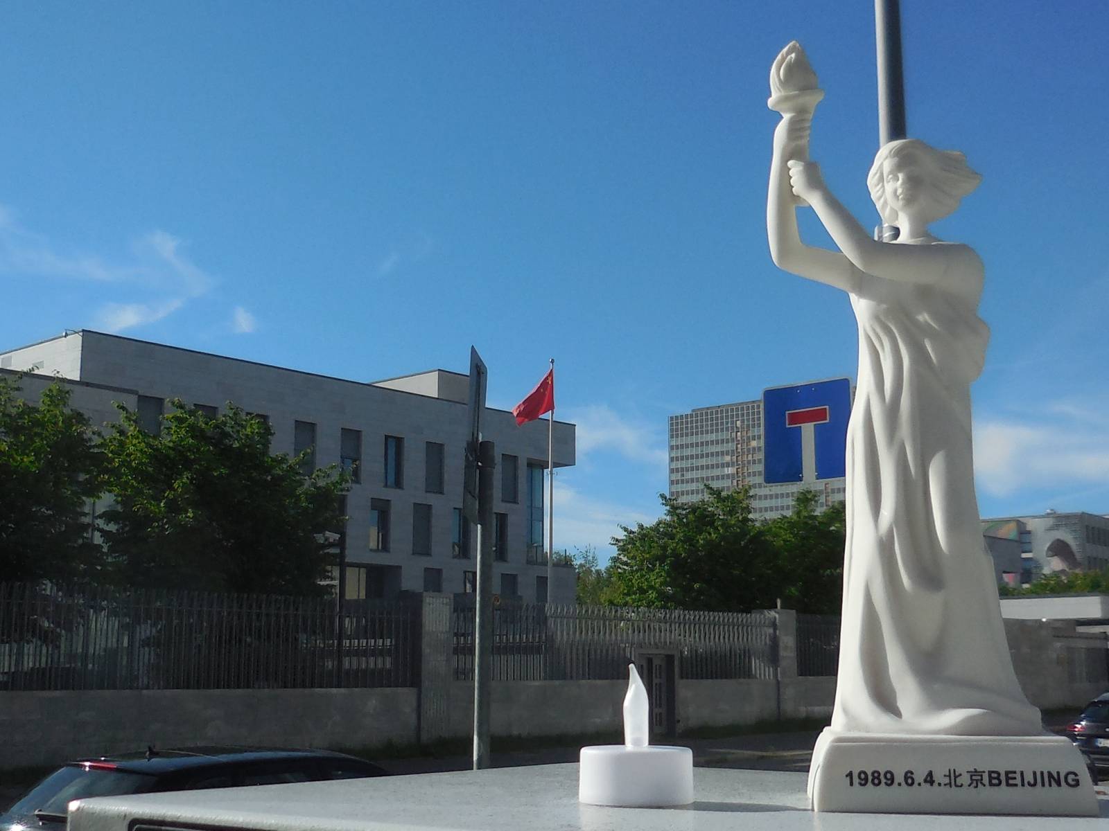 Goddess of Democracy and e-candle in front of the prc consulate in Munich, Germany on June 4th, 2026